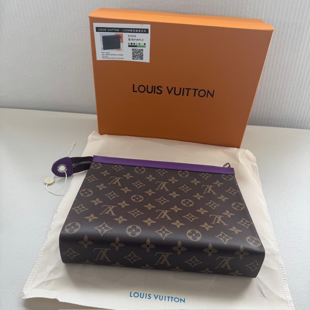 Brown and purple clutch , new in box